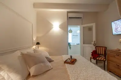 Letto o letti in una camera di Sweet Pergola - Flo Apartments