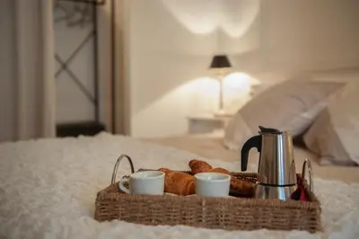 Letto o letti in una camera di Sweet Pergola - Flo Apartments