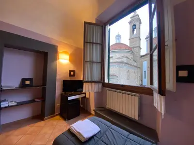 Letto o letti in una camera di Emerald Palace