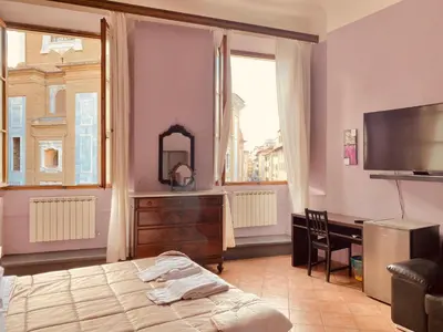 Letto o letti in una camera di Emerald Palace