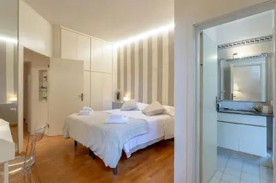Letto o letti in una camera di La Perla Del Borgo Apartment