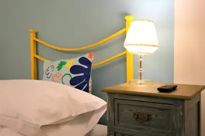 Letto o letti in una camera di Wine Apartments Florence Nebbiolo