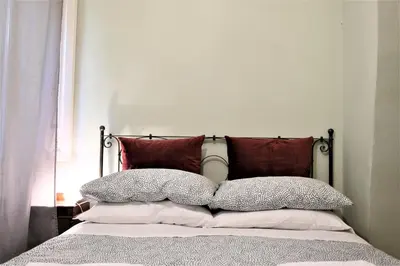 Letto o letti in una camera di Wine Apartments Florence Nebbiolo