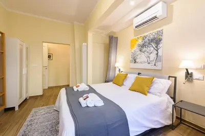 Letto o letti in una camera di [Santa Croce VIEW] - Santa Croce Centro Di Firenze