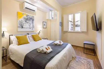 Letto o letti in una camera di [Santa Croce VIEW] - Santa Croce Centro Di Firenze