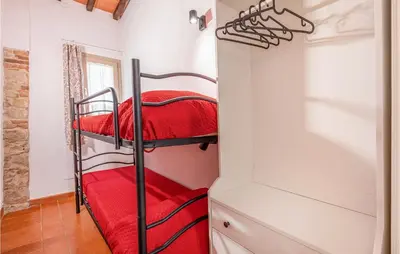 Letto o letti in una camera di Cozy Apartment In Rignano Sull'arno