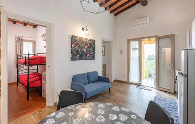 Area soggiorno di Cozy Apartment In Rignano Sull'arno
