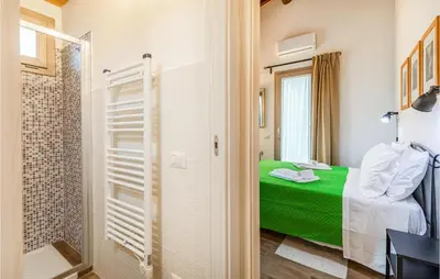 Letto o letti in una camera di Gorgeous Apartment In Rignano Sull'arno