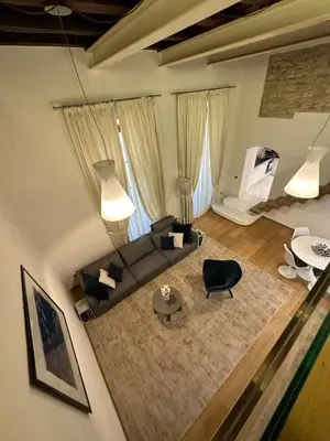 Letto o letti in una camera di Elegante appartamento Borgo San Jacopo