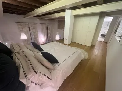 Letto o letti in una camera di Elegante appartamento Borgo San Jacopo