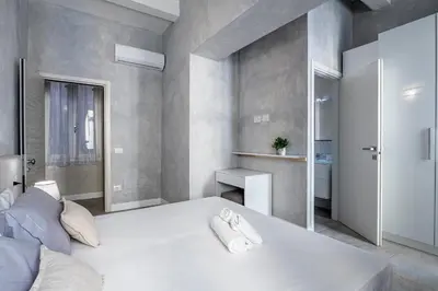 Letto o letti in una camera di [5 Minuti - Duomo] Tripla Suite Luxury