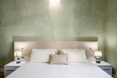 Letto o letti in una camera di [5 Minuti - Duomo] Tripla Suite Luxury