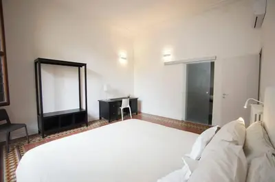 Letto o letti in una camera di 5 min Duomo - Novella Boutique - Parcheggio
