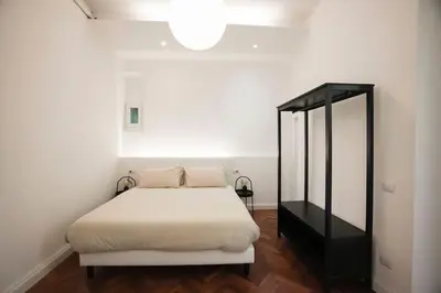Letto o letti in una camera di 5 min Duomo - Novella Boutique - Parcheggio