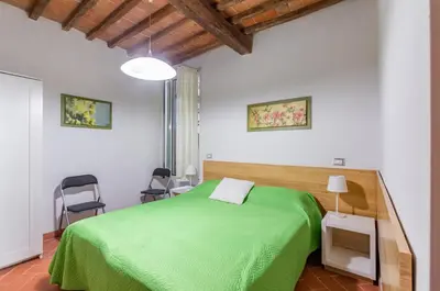 Letto o letti in una camera di GuestHost - Boboli Gardens Lovely Apartment