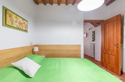 Letto o letti in una camera di GuestHost - Boboli Gardens Lovely Apartment