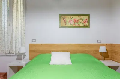 Letto o letti in una camera di GuestHost - Boboli Gardens Lovely Apartment
