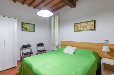 Letto o letti in una camera di GuestHost - Boboli Gardens Lovely Apartment