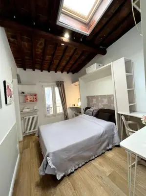 Letto o letti in una camera di Tuscany Charm #Firenze