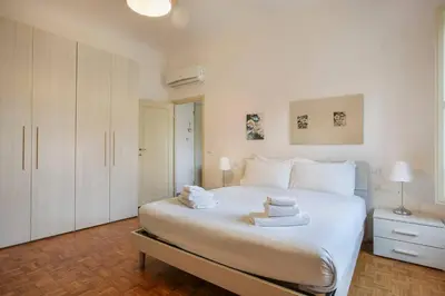 Letto o letti in una camera di Palazzo Borghese 2 Bedroom