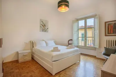 Letto o letti in una camera di Palazzo Borghese 2 Bedroom
