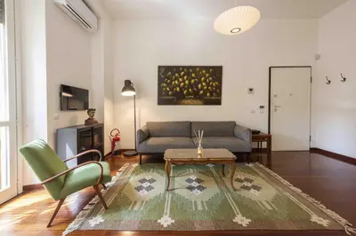 Area soggiorno di Poliziano Apartment by Mmega