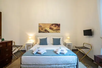Letto o letti in una camera di Terme Suite Florence Luxury in a 14th century palace