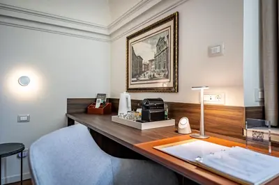 Letto o letti in una camera di Dimora Collection - Le Corti - Boutique Luxury Suites in a Restored 13th Century Convent, with Sauna and Gym