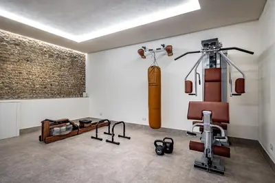 Palestra o centro fitness di Dimora Collection - Le Corti - Boutique Luxury Suites in a Restored 13th Century Convent, with Sauna and Gym