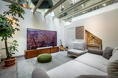 TV o dispositivi per l'intrattenimento presso Dimora Collection - Le Corti - Boutique Luxury Suites in a Restored 13th Century Convent, with Sauna and Gym