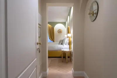 Letto o letti in una camera di Dimora del Mercante - Luxury rooms