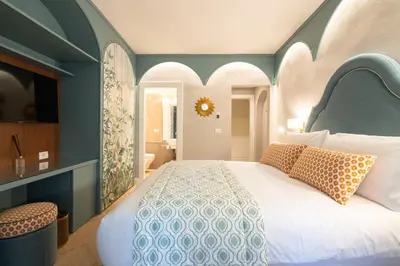 Letto o letti in una camera di Dimora del Mercante - Luxury rooms