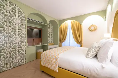Letto o letti in una camera di Dimora del Mercante - Luxury rooms