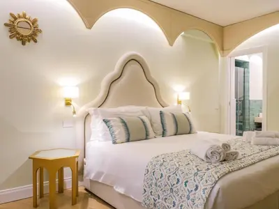 Letto o letti in una camera di Dimora del Mercante - Luxury rooms