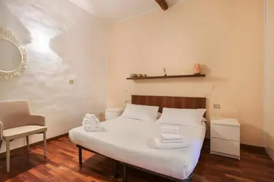 Letto o letti in una camera di Santa Croce 2 bedroom