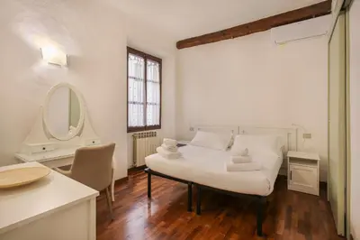 Letto o letti in una camera di Santa Croce 2 bedroom