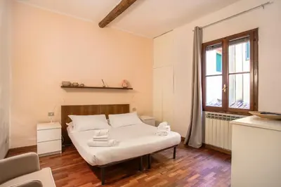 Letto o letti in una camera di Santa Croce 2 bedroom