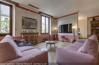 Area soggiorno di Don Minzoni District Apartments by Mamo Florence