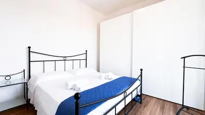Letto o letti in una camera di Ghiberti Boutique Apartment
