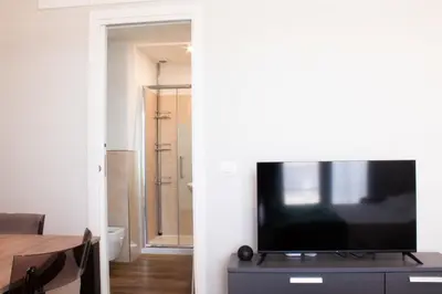 TV o dispositivi per l'intrattenimento presso Ghiberti Boutique Apartment
