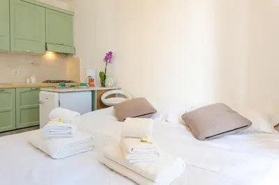 Letto o letti in una camera di Vespucci Suite Home