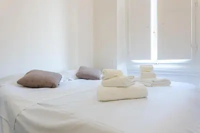 Letto o letti in una camera di Vespucci Suite Home