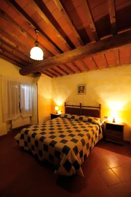 Letto o letti in una camera di Agriturismo San Lorenzo