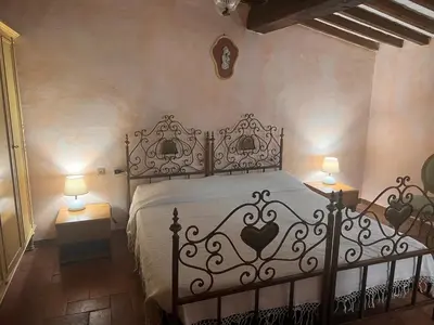 Letto o letti in una camera di Agriturismo San Lorenzo