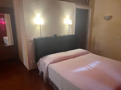 Letto o letti in una camera di Agriturismo San Lorenzo