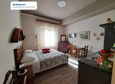 Letto o letti in una camera di IL REGNO DI IOSE'