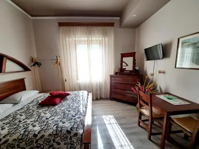 Letto o letti in una camera di IL REGNO DI IOSE'