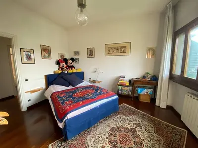Letto o letti in una camera di Casa Ila