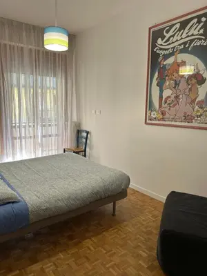 Letto o letti in una camera di Marie Home Florence
