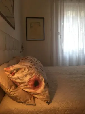 Letto o letti in una camera di Marie Home Florence